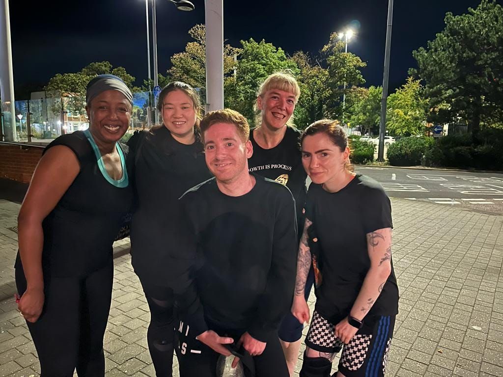 Medina with class members outside after an evening class